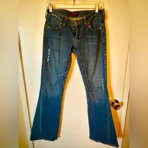 BCBG women’s distressed jeans with holes and  distressed spots as in picture.
